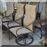 L05. Set of 6 outdoor patio chairs including 2 swivel chairs. 